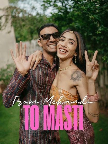 "From Mehendi to Masti," this photo perfectly captures the fun-loving spirit of Kabir and Nikita's pre-wedding celebration. Their playful poses and big smiles say it all.