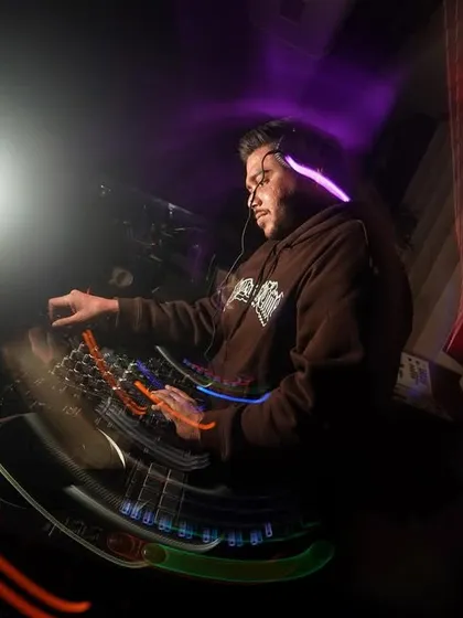 A unique wide-angle, motion-blur photo that puts you right in the middle of the action at the DJ booth.