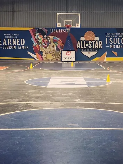 This is where the magic happens. Our full court is flanked by a mural of legends like LeBron James, Lisa Leslie, and Michael Jordan to inspire every player who steps on the floor. It’s a constant reminder of what’s possible with hard work and dedication.
