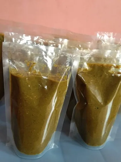 Pouches of my homemade Goan green curry paste, Cafreal. It's a vibrant and herby paste perfect for making the classic Goan chicken Cafreal.