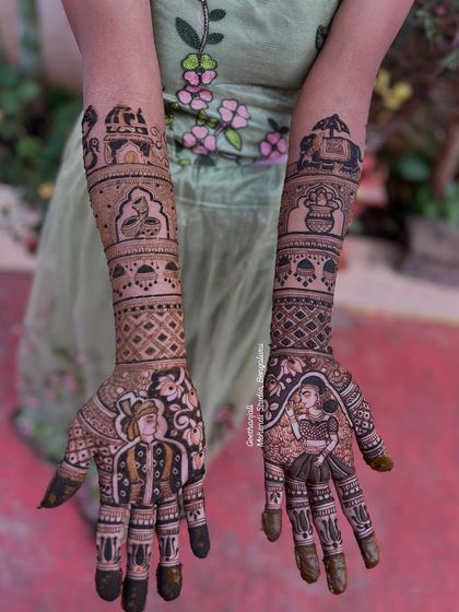 This full bridal design includes detailed portraits of the bride and groom, along with traditional symbols like a kalash and elephants.