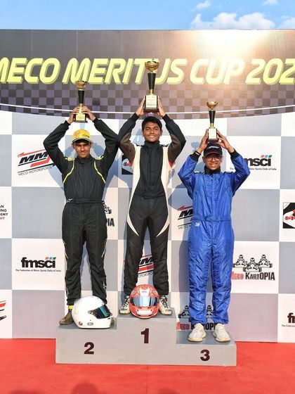 The Senior Class podium from Round 1 of the Meco Meritus Cup 2024, with the top three drivers holding their trophies high.