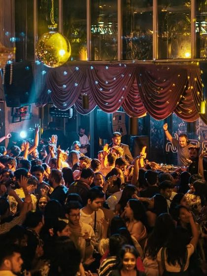 The scene at Sarjapur Social is always buzzing. A packed house under the iconic chandelier and disco ball makes for an unforgettable party atmosphere.
