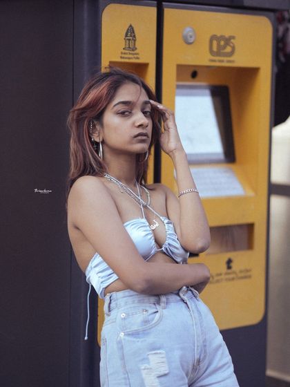 Another angle from the Church Street session, showing a confident pose and interaction with the urban environment. This is great for building a model's portfolio.