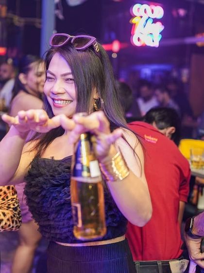 Enjoying a drink and the music at Happy Brew. It's a night for everyone.