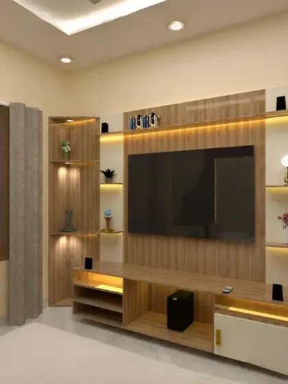 A full-wall entertainment unit with integrated display shelves and accent lighting. This custom piece provides ample storage and a beautiful backdrop for the television.