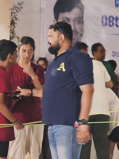 A coach's guidance during a meet is crucial. Here I am discussing race strategy with Aryaman Suri, who went on to qualify for the Haryana State and Junior State championships for the very first time.