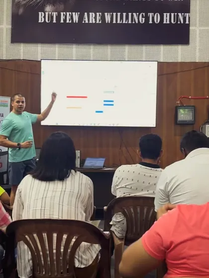Pointing out key metrics on a performance data chart. I teach coaches how to identify the most important variables for their sport, whether it's for boxing, football, or kabaddi.