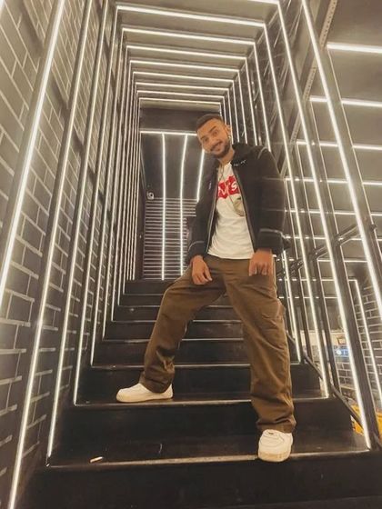 Déjà vu. This futuristic staircase is the perfect backdrop for my forward-thinking approach to music and style.