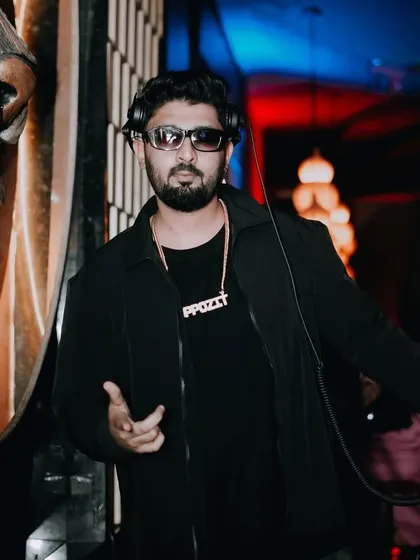In the zone at Badmaash, with the iconic tiger logo in the background.
