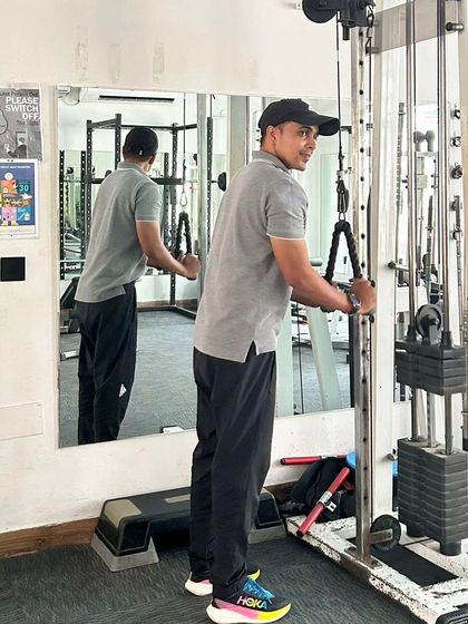 A mid-rep shot of the tricep pushdown, showing the focus and control required.