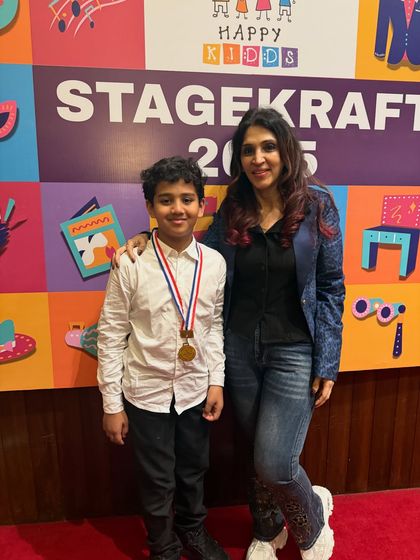 Celebrating a student's success at StageKraft. His confidence and poise on stage were truly remarkable.