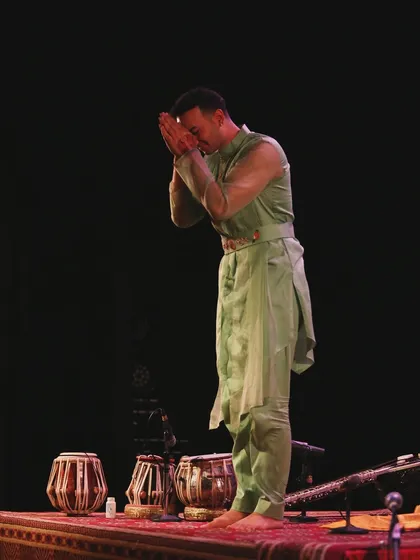 A moment of 'pranam' or bowing in gratitude to the audience and the stage in London.