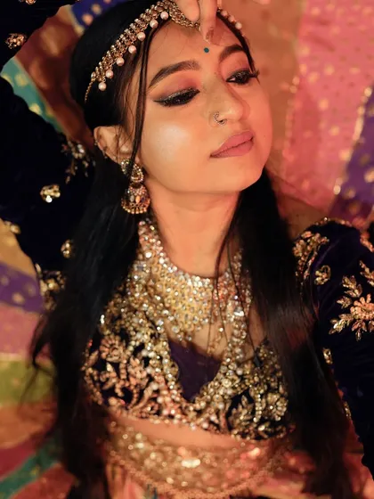 A close-up shot highlighting the intricate makeup and jewelry that completes the Navratri look. It's all in the details!