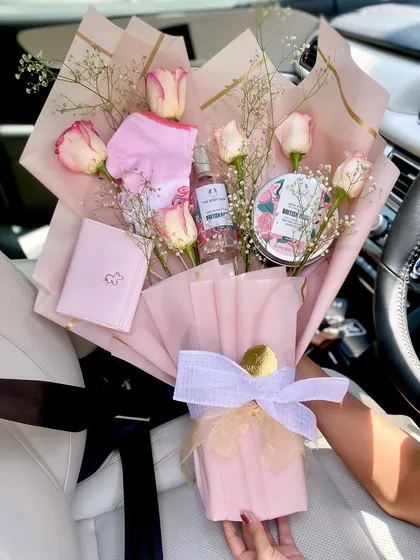 Why give just flowers when you can give a "BOUQUET-ish"? This is one of my favorite creations, where I hide beautiful gifts inside a fresh flower bouquet for a truly surprising and delightful experience.