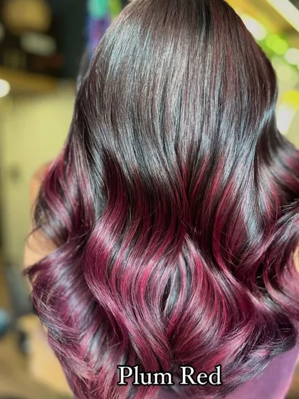 Who says you need bleach for bold color? This stunning plum red ombré was achieved without any bleach, protecting the hair's integrity while delivering a rich, vibrant, and head-turning result.