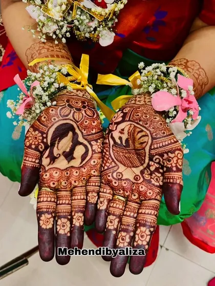 The beautiful henna stain on a baby shower design. The portraits of the mother and baby are so clear and heartwarming.