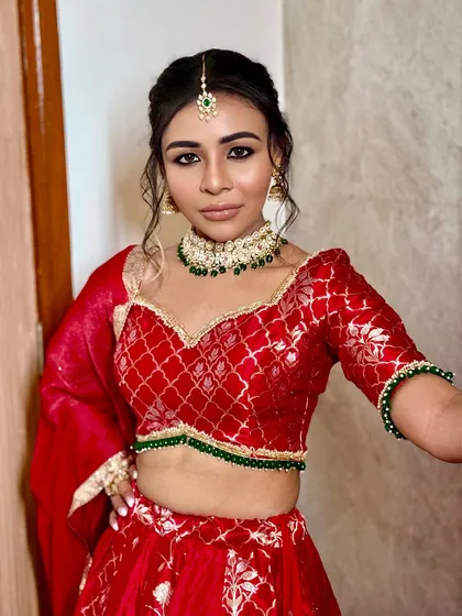 A close-up of the bold and beautiful makeup for the Mata Ki Chowki. The smoky eye and defined features create a powerful and devotional look.