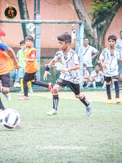 The focus and intensity during a match. Every player is trained to be sharp, agile, and tactically aware, demonstrating their ball control and game awareness under pressure.