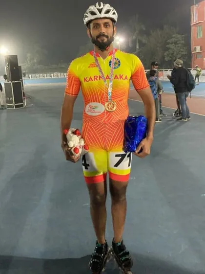 After a successful race at the 59th National Championship, holding my gold medal. This is the standard I set for myself and my students.