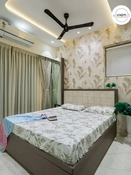 This angle shows the cove lighting that provides a soft, ambient glow to the room.