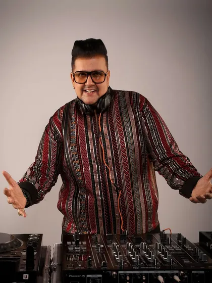 A great shot from a recent photoshoot. I believe a DJ's presence is just as important as the music, and I always bring my A-game, both in sound and style.