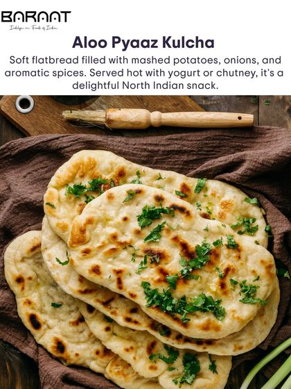 Our Aloo Pyaaz Kulcha is a soft flatbread filled with mashed potatoes, onions, and aromatic spices, a delightful North Indian snack.