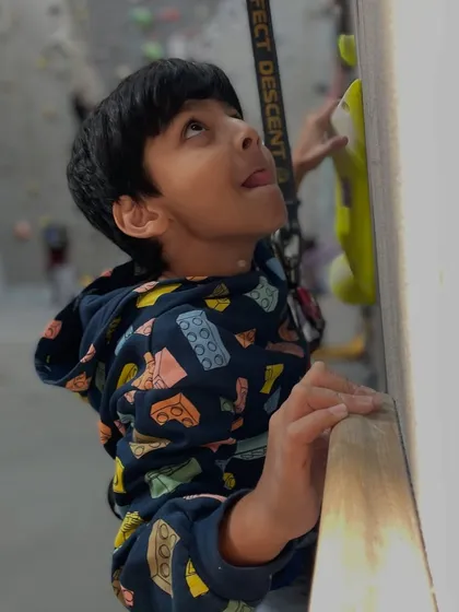With a little bit of concentration and courage, this young climber is making his way to the top. It's a fantastic confidence booster for kids.