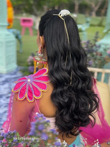 Another back view of the stylish and fun high ponytail.