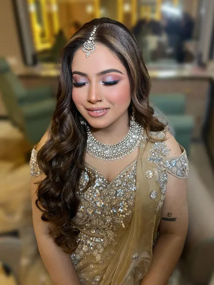 A close-up of the beautiful, shimmery eye makeup.