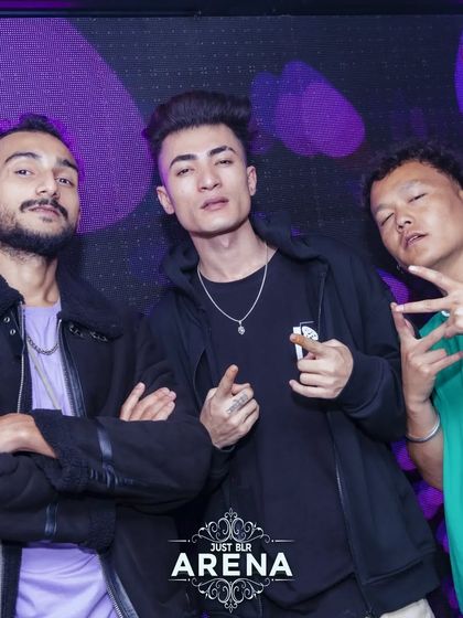 Hanging out with friends and fellow performers at Just BLR Arena. The nightlife community is a huge part of my journey.