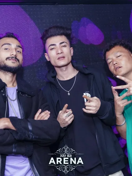 Hanging out with friends and fellow performers at Just BLR Arena. The nightlife community is a huge part of my journey.
