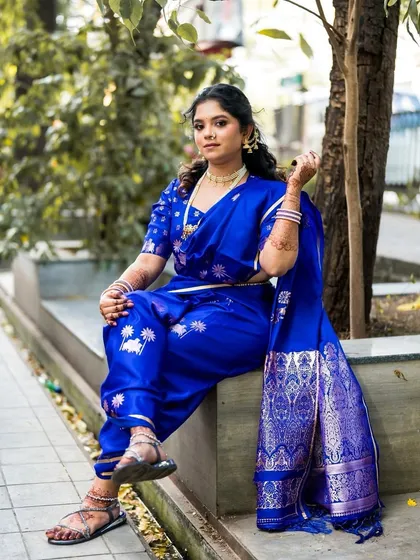 A modern take on Maharashtrian tradition. This bride looks like a warrior princess in her royal blue Nauvari, draped for comfort and style. I gave her a fresh, minimal makeup look with a soft glam feel to match her powerful and elegant engagement attire.