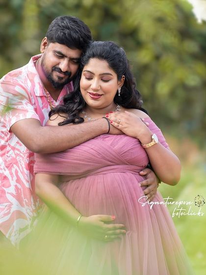 A tender moment between a couple, captured outdoors with a soft, dreamy focus and beautiful natural light.