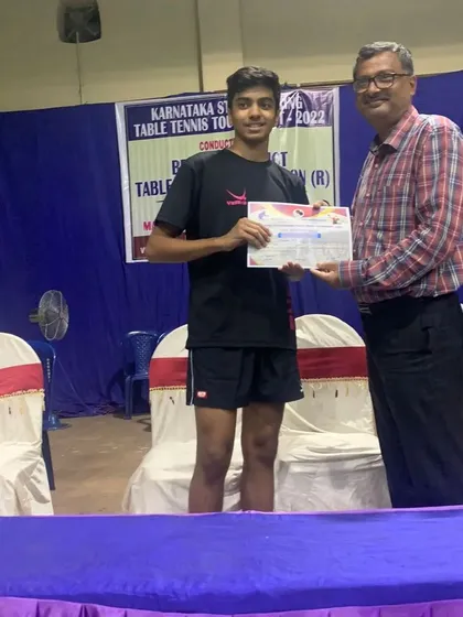 Samyak K receiving his certificate for reaching the U19 Semifinals at the Bellary tournament.
