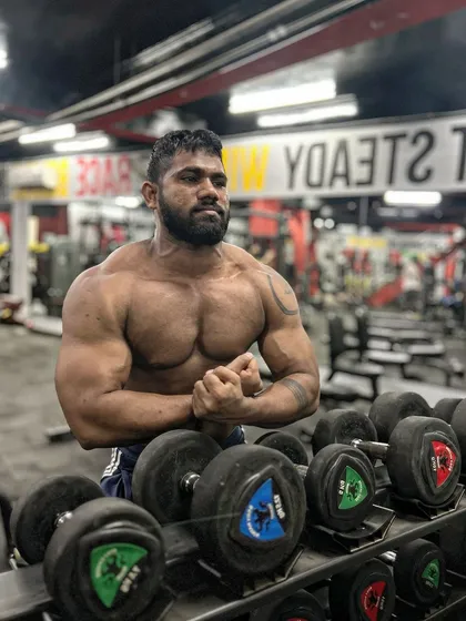 A front pose in the same spot. Showing the chest and arm development from my bulk.