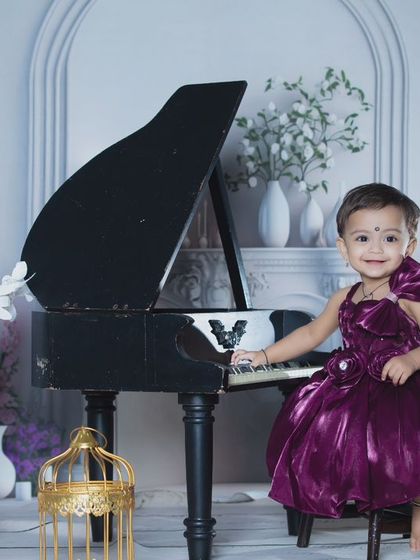 Another shot of our elegant pianist in her purple dress, looking like a true performer.