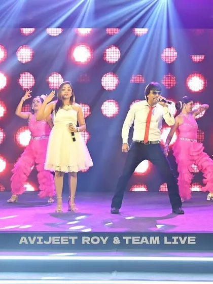 A duet performance with my partner, backed by the full dance team. We offer a variety of song styles, from solos to duets, to suit the mood of the event.