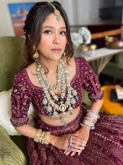 All glammed up. A beautiful party look for Anushka, featuring a rich velvet lehenga and sparkling jewelry.