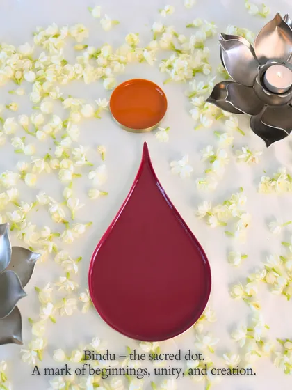 The Bindu, a sacred dot representing beginnings and unity, is the inspiration for this piece. This top-down shot highlights the pure, symbolic form of the plate, designed to hold your festive mithai with grace.