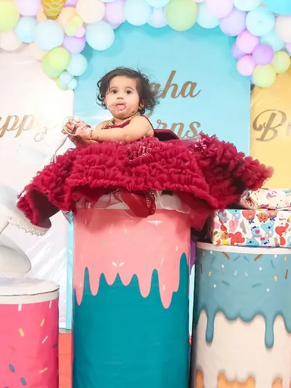 A sweet and colorful ice cream and donut themed first birthday party, perfect for capturing the fun of a cake smash.