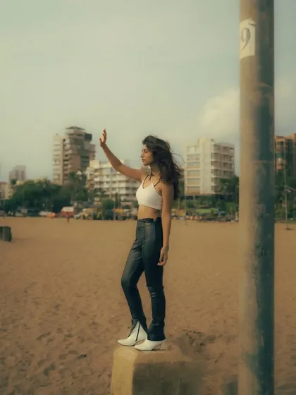 An editorial-style beach shoot with an edgy, high-fashion look. The mix of color and black and white images shows the versatility of a single location.