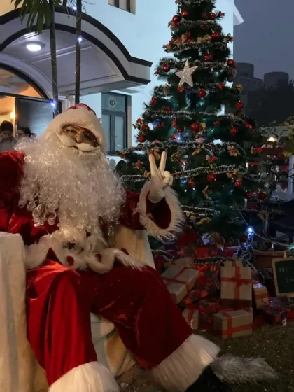 Make your holiday event extra special by hiring Santa Claus. This picture shows our Santa character ready to greet guests, listen to wishes, and bring the magic of Christmas to your celebration.