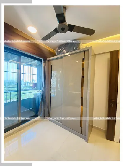 This image shows the sliding wardrobe in the compact kid's bedroom. Sliding doors are an excellent choice for small rooms as they don't require extra space to open.