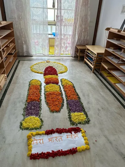 The vibrant colors of flower petals come together to form a rocket, a project that sparked so much curiosity and conversation among the children.