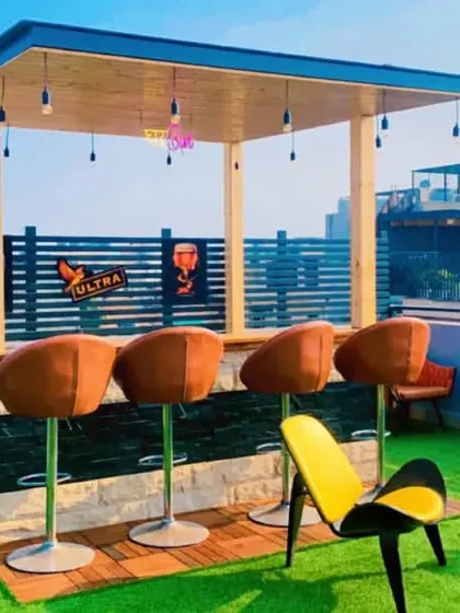 Your home can be the best party spot in town. We designed and built this custom rooftop bar, complete with a covered pergola, high-top seating, and vibrant decor, creating the perfect space for entertaining friends and family.