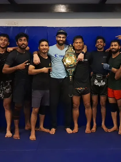 This is what it's all about. Celebrating Coach Chungreng's monumental win. His work ethic is an inspiration to all of us. Fought four rounds on Saturday, could barely walk, and still showed up Monday to teach. That's a champion.