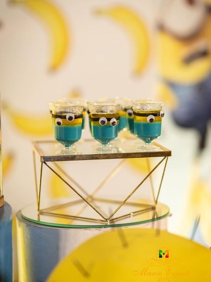 Even the dessert cups got a Minion makeover. These small, creative touches are what I love about planning themed parties, ensuring every single element contributes to the overall experience.