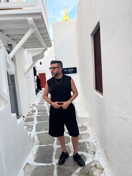 A different angle of my Mykonos outfit, showing how the simple silhouette works within the narrow, picturesque streets of the Greek island.