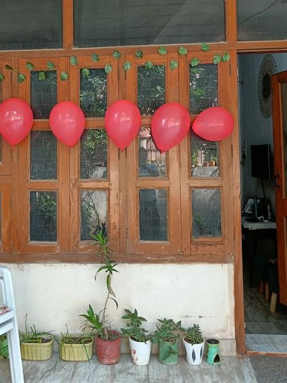 Another look at the party decorations set up along the windows of my home. I make sure every corner feels festive to create a complete party atmosphere for you and your guests.